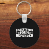 Dissertatie Verdedigd 2025 PhD EDD doctoraat Gradu Sleutelhanger (Voorkant)