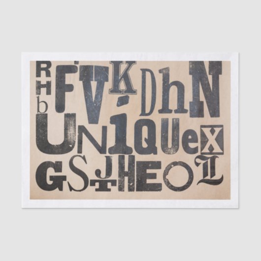 Distressed alfabet letters spelling "uniek" tissuepapier (Voorkant)