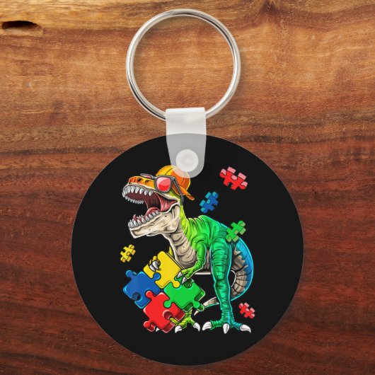 Dit dinosaurusautisme is een dino sleutelhanger (Voorkant)