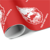 Dit is geen kerstpapier voor de kerstman. cadeaupapier (Rol Hoek)