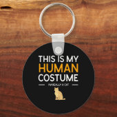 Dit is mijn menselijke kostuum... ik ben echt een sleutelhanger (Voorkant)