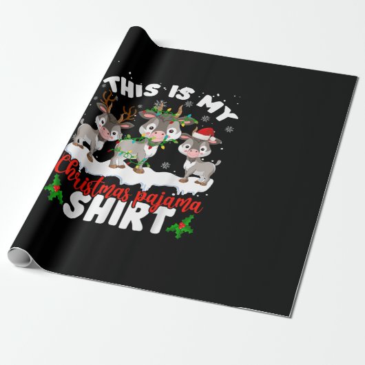 Dit is m'n kerstcadeaubon met kerstpajama cadeaupapier (Uitgerold)