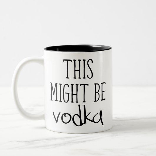 Dit kan wodka zijn. tweekleurige koffiemok (Links)