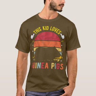 Dit Kind houdt van de varkensstapels in Guinee en T-shirt