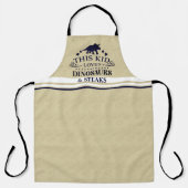 Dit kind is dol op dinosauriurussen en op een aang schort (Voorkant)