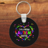 Dit kleurrijke autisme hart gemaakt met puzzelstuk sleutelhanger (Voorkant)