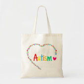 Dit kleurrijke autisme hart gemaakt met puzzelstuk tote bag (Voorkant)