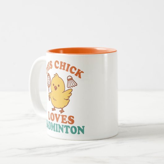 Dit kuiken houdt van badminton tweekleurige koffiemok (Voorkant links)