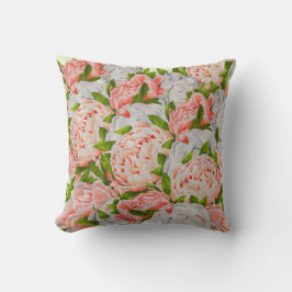 Diverse pioenen op een kussen