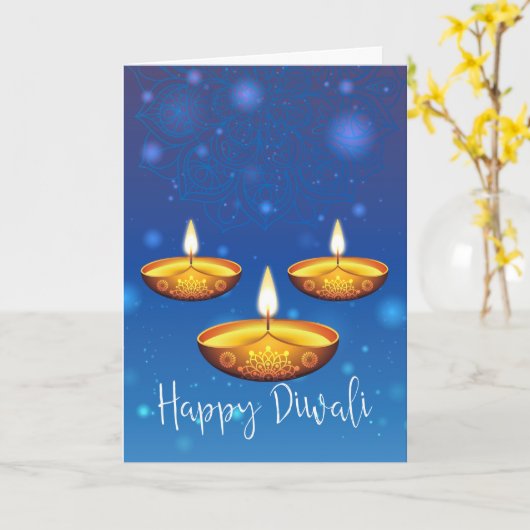 Diwali begroeting met lampen, blauwe achtergrond b kaart (Gele Bloem)