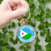 Djibouti Round Emblem Sleutelhanger (Hand)