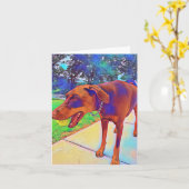 Doberman die Blank Wenskaart speelt Kaart (Gele Bloem)