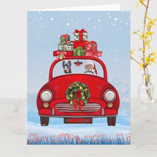 Doberman Dog in auto met kerstman Kaart (Gele Bloem)