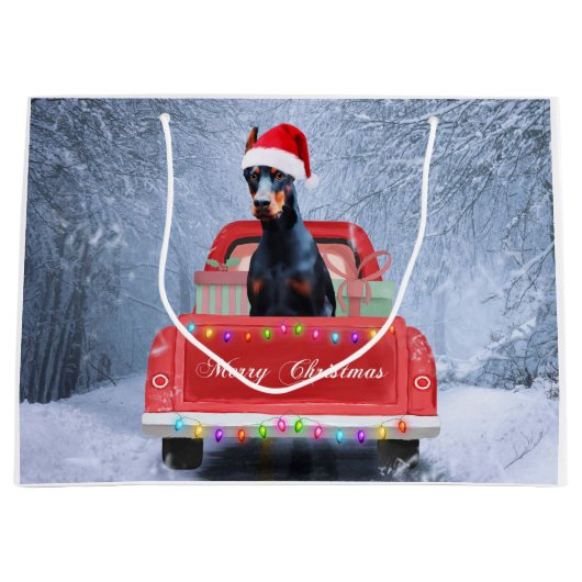 Doberman Dog in sneeuw, met Kerstmis Groot Cadeauzakje (Voorkant)