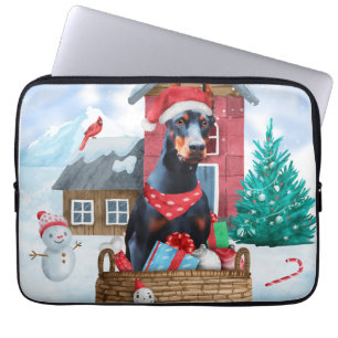 Doberman Dog in sneeuwkersthondenhuis Laptop Sleeve