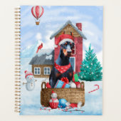 Doberman Dog in sneeuwkersthondenhuis Planner (Voorkant)