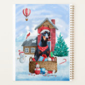 Doberman Dog in sneeuwkersthondenhuis Planner (Achterkant)