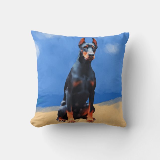 Doberman hond zitten op het strand kussen (Voorkant)