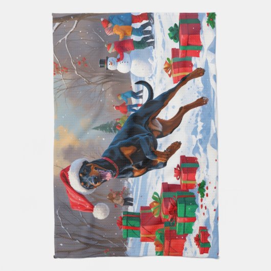 Doberman loopt in de sneeuw met kerst Pet Theedoek (Verticaal)