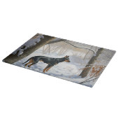 Doberman Pinscher liet het sneeuwen Kerstmis Snijplank (Hoek)