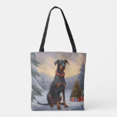Dobermann-hond in de sneeuw met Kerstmis  Tote Bag (Achterkant)