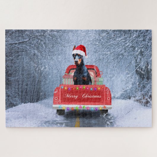 Dobermann-hond in de sneeuw zittend in de Kersttru Legpuzzel (Horizontaal)