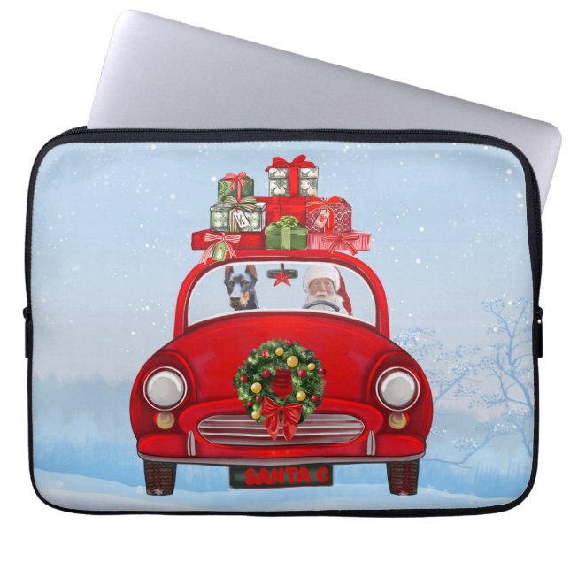 Dobermann in auto met kerstman  laptop sleeve (Voorkant)