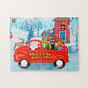 Dobermann in Kerstbezorgtruck Sneeuw Legpuzzel