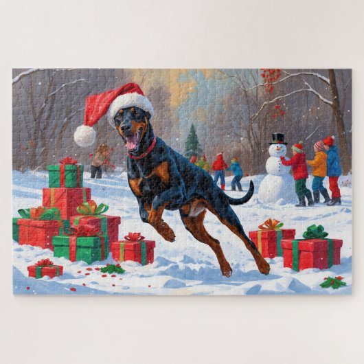Dobermann loopt in de sneeuw met kerstmuts legpuzzel (Horizontaal)