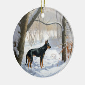 Dobermann Sneeuwt het Kerstmis Keramisch Ornament (Links)