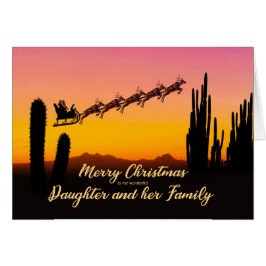 Dochter en kerstkerstkerstman over woestijn