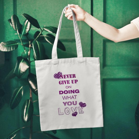 Doe wat je van motivatie teksttypografie houdt tote bag