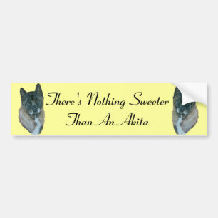 Dog portret of black faced akita with slogan bumpersticker