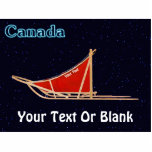 Dog Sled - Canada Fotobeeldje Magneet<br><div class="desc">A dog sled with a red sled bag superimposed on a starry background. Text reading,  "Canada" appears in glowing blue. You may add your own additional text both on the sled bag and at the bottom.</div>