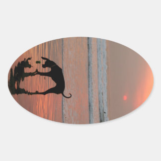 Dog sunset ovale sticker