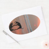 Dog sunset ovale sticker (Envelop)