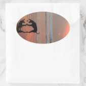 Dog sunset ovale sticker (Tas)