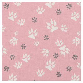 Dog voetafdrukken op een roze achtergrond stof