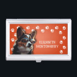 Dog Walker Paw Prints Visitekaarthouder<br><div class="desc">Deze visitekaartjes houder,  gepersonaliseerd met jouw naam,  heeft een schattige terriërpuppy op fel sinaasappel met een witte pootafdruk. Leuk als cadeau of een geweldige manier om je eigen visitekaartjes te dragen.</div>