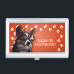 Dog Walker Paw Prints Visitekaarthouder<br><div class="desc">Deze visitekaartjes houder,  gepersonaliseerd met jouw naam,  heeft een schattige terriërpuppy op fel sinaasappel met een witte pootafdruk. Leuk als cadeau of een geweldige manier om je eigen visitekaartjes te dragen.</div>