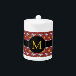 Dog Year 2018 Zodiac Birthday Monogram Teapot Theepot<br><div class="desc">theepot met blauw en geel hondenpatroon op donkerrode achtergrond zwarte band en rond label voor Monogram vooraan. U kunt monogram gemakkelijk veranderen en tekst (doopvont, kleur, grootte en positie) toevoegen door de aanpassingsknoop te klikken. Matching cloth napkin, placemat en veel andere producten... Ideaal voor Chinees nieuwjaar van de Dog 2018...</div>