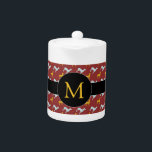 Dog Year 2018 Zodiac Birthday Monogram Teapot Theepot<br><div class="desc">theepot met blauw en geel hondenpatroon op donkerrode achtergrond zwarte band en rond label voor Monogram vooraan. U kunt monogram gemakkelijk veranderen en tekst (doopvont, kleur, grootte en positie) toevoegen door de aanpassingsknoop te klikken. Matching cloth napkin, placemat en veel andere producten... Ideaal voor Chinees nieuwjaar van de Dog 2018...</div>