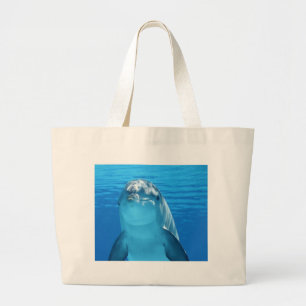 Dolfijn duikt op uit het water grote tote bag