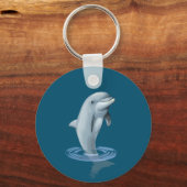 Dolfijn en tekst op oceaanblauw sleutelhanger (Achterkant)