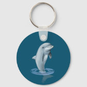 Dolfijn en tekst op oceaanblauw sleutelhanger (Achterkant)