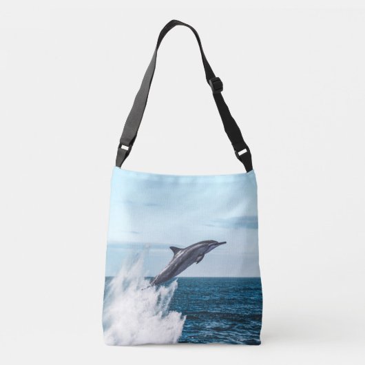Dolfijn springt uit de oceaan crossbody tas (Achterkant)