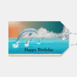 dolfijnen die uit het water springen in de oceaan cadeaulabel