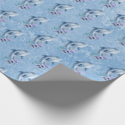 Dolfijnen en bloemen op blauw cadeaupapier (Hoek)