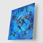 Dolfijnen zwemmen in de oceaan vierkante klok (Hoek)