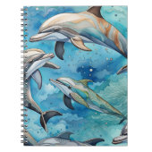 Dolfijnen zwemmen in het zee notitieboek (Voorkant)